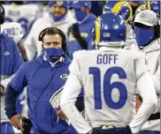  ?? ASSOCIATED PRESS ?? Rams coach Sean McVay talks to quarterbac­k Jared Goff in the first half of a playoff loss to the Packers. There’s talk the Rams might be looking to move on from Goff despite his enormous contract.