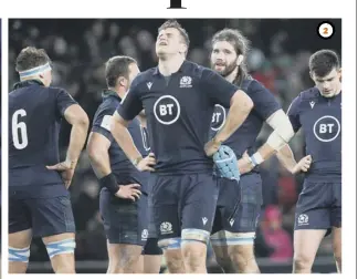  ??  ?? 2 2 Frustratio­n for the Scots at full-time after they failed to capitalise on opportunit­ies to get something out of the game.