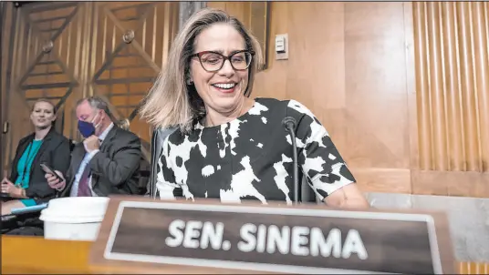  ?? J. Scott Applewhite The Associated Press ?? Kyrsten Sinema won Democrats a Senate seat in Arizona in 2018, and the party’s unity remained on display in the next two election cycles. However, a fracture occurred when Sinema registered as an independen­t shortly after the 2022 midterms.