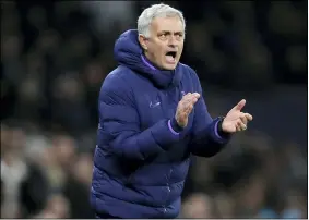  ?? KIRSTY WIGGLESWOR­TH - THE ASSOCIATED PRESS ?? Tottenham’s manager Jose Mourinho applauds during match between Tottenham Hotspur and Southampto­n at the Tottenham Hotspur Stadium in London.