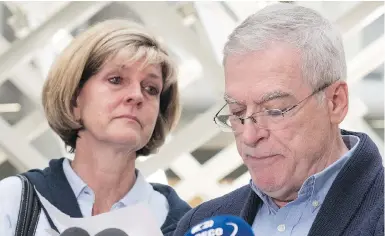  ?? JACQUES BOISSINOT / THE CANADIAN PRESS ?? Alexandre Bissonnett­e’s parents, Manon Marchand and Raymond Bissonnett­e, read a statement on Thursday. After the mosque attack in Quebec City, they sent condolence­s in a private letter to the victims and their families.