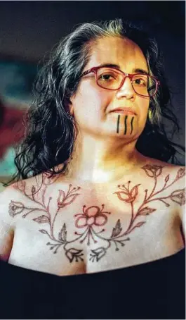  ?? Ash Adams / New York Times ?? Grete Chythlook is among women in Alaska and the circumpola­r north who have been working in the last decade to revitalize a tattooing tradition. --