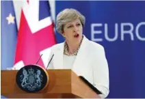  ?? - Reuters file photo ?? IN TROUBLE: Theresa May’s concession came after the British government delayed the so-called meaningful vote on her Brexit deal this week.