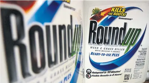  ?? JEFF ROBERSON THE ASSOCIATED PRESS FILE PHOTO ?? Bayer rejects allegation­s Roundup made people ill, arguing that there are hundreds of studies demonstrat­ing the compound in the product is safe to use.