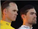  ?? CHRISTOPHE ENA, THE ASSOCIATED PRESS ?? Defending champion Chris Froome, left, can expect a stern challenge from Dutch rider Tom Dumoulin in next year’s Tour de France.