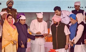  ?? PTI ?? Venkaiah Naidu (centre), Nitin Gadkari, Capt Amarinder Singh and Harsimrat Badal (left) with others during the foundation stone laying ceremony for the Gurdwara Kartarpur Sahib Corridor, at Dera Baba Nanak, in Gurdaspur, on Monday. —