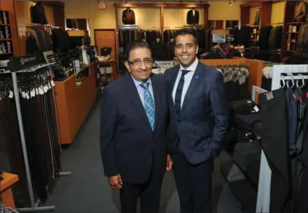  ?? BRENT DAVIS, RECORD STAFF ?? Moe Visram and his father, Sam, own Trends For Men, a clothing retailer with stores at the Sunrise Shopping Centre and the St. Jacobs Outlets.