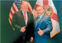  ?? AP ?? This undated image released by the House Judiciary Committee from documents provided by Lev Parnas to the committee in the impeachmen­t probe against President Donald Trump, shows a photograph of Parnas with Trump in Florida.