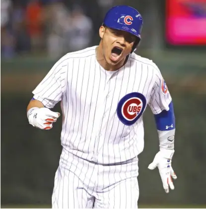  ?? | GETTY IMAGES ?? Catcher Willson Contreras is pumped up as he rounds the bases after hitting a home run in the seventh inning Monday.