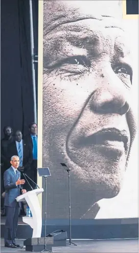  ?? [ AFP ] ?? Barack Obamas Hommage an Nelson Mandela, den „Giganten der Geschichte“.
