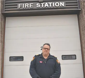  ?? [VERONICA REINER / THE OBSERVER] ?? Wellesley fire chief Paul Redman, seen here at the St. Clements fire station, says he’s pleased with the potential new changes to legislatio­n covering double hatters.