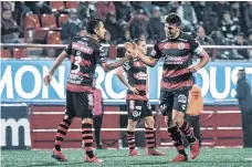  ?? /IMAGO7 ?? Jugadores de Xolos celebran el triunfo sobre Tuzos.