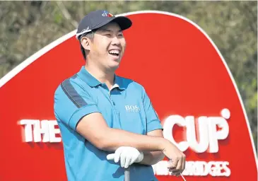  ?? GETTY IMAGES ?? An Byeong-Hun smiles on the third tee during the first round of the CJ Cup.