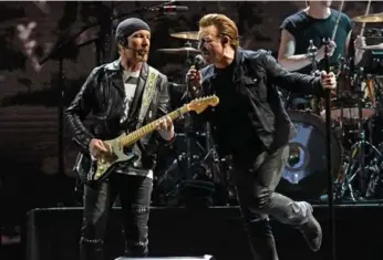  ?? MIKE COPPOLA/GETTY IMAGES ?? U2 guitarist The Edge has been playing Fender guitars since he was a teen and is now on the company’s board.