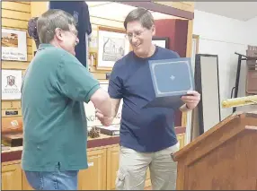  ?? ?? Bella Vista Civil War Round Table Vice President chuck Pribbernow (right) gives a certificat­e of appreciati­on to dale Phillips, who is the group’s president and was the dec. 2 speaker. (courtesy photo)