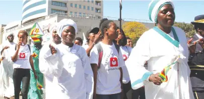  ?? Pic: Tawanda Mudimu ?? Apostolic church members join the Zimbabwe Tourism Authority-organised 2018 Harmonised Election Peace March in Harare last week.