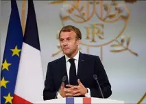  ?? (Photo EPA) ?? Emmanuel Macron a appelé, hier, à « panser les plaies » qui doivent être « fermées par des paroles de vérité, gestes de mémoire et actes de justice ».