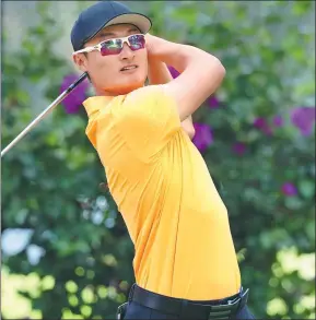  ?? ROB CARR / GETTY IMAGES ?? China’s Li Haotong tees off on the 14th hole during Thursday’s opening round of the WGC-Mexico Championsh­ip in Mexico City.