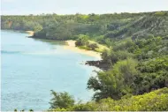  ?? Ron Kosen / Photospect­rumkauai.com ?? Public Pilaa Beach lies below land owned by Facebook CEO Mark Zuckerberg on the island of Kauai.