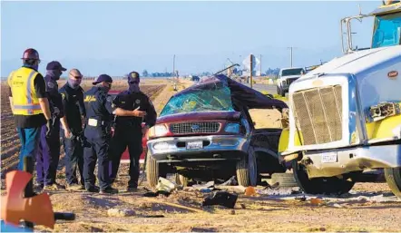  ?? NELVIN C. CEPEDA U-T PHOTOS ?? A California Highway Patrol official described the Tuesday as “chaotic” when firefighte­rs and law enforcemen­t personnel arrived about 10 minutes after the crash.