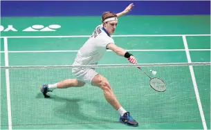  ??  ?? Denmark’s Viktor Axelsen in action during the men’s singles final match against Taiwan’s Chou Tien-chen.