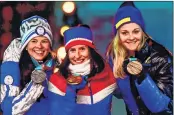  ??  ?? Finland's Krista Parmakoski (silver), Norway's Marit Bjoergen (gold) and Sweden's Stina Nilsson (bronze) on the podium.
