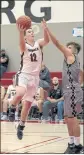  ?? ?? Clear Lake’s Drake Smart soars to the hoop against San Rafael during Saturday action.