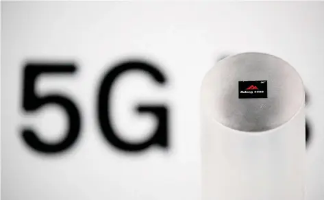 ?? ANDY WONG/AP ?? Huawei’s 5G modem Balong 5000 chipset is displayed in Beijing last month. The Canadian government is expected to make a decision on Huawei’s future in Canada in the coming months after concluding a 5G security review. Huawei denies allegation­s its equipment is used for spying.