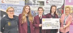  ??  ?? ●● Students Eloise Lambert (year 11), Henry Bridgett (year nine), Eleanor Hall (year 11), with Cath Linaker (deputy head of year eight), far left, and Leah Goodhind from East Cheshire Hospice