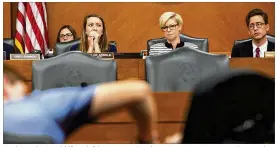  ?? LYNDA M. GONZALEZ / AMERICAN-STATESMAN ?? Analyst Kyler Arnold (from left), state Rep. Sarah Davis, R-West University Place, and committee director Bobby Joe Dale hear Caroline Cheevers’ testimony about her adopted son being denied a prescripti­on antibiotic.