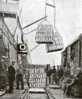  ?? COPIES OF PICTURE AVAILABLE FROM ODT FRONT OFFICE, LOWER STUART ST, OR WWW.ODTSHOP.CO.NZ ?? Watersider­s load apples for export on to SS Hororata at Port Chalmers. In all, 9238 cases were shipped. — Otago
Witness, 1.4.1924