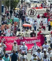  ??  ?? Proteste a San Salvador contro il Bitcoin valuta legale