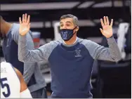  ?? Laurence Kesterson / Associated Press ?? Villanova coach Jay Wright reacts during a game against Seton Hall earlier this month.