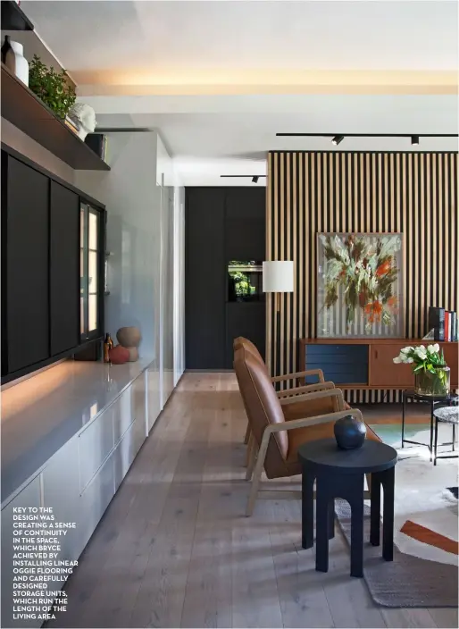  ??  ?? key to the design was creating a sense of continuity in the space, which bryce achieved by installing linear oggie flooring and carefully designed storage units, which run the length of the living area