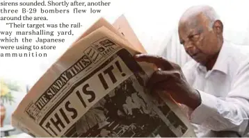  ??  ?? V. Mahalingam reading from his copy of the ‘The Sunday Times’ broadsheet newspaper dated Sept 1, 1957, a day after the proclamati­on of independen­ce. PIC BY ROSELA ISMAIL