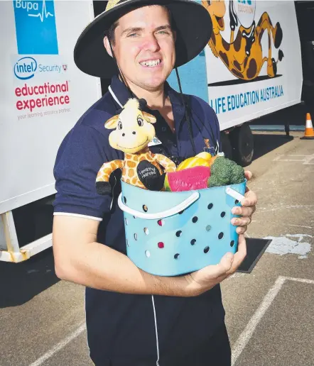  ?? ESSENTIAL LESSONS: Educator Tim McKean outside the Life Education mobile learning centre. Picture: SHAE BEPLATE ??