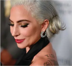  ??  ?? Apology: Lady Gaga said she is sorry for her ‘poor judgment’ when she was young and for not speaking out sooner