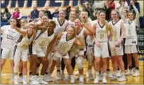  ?? BARRY BOOHER — FOR THE NEWS-HERALD ?? John Carroll celebrates its victory over Otterbein on Feb. 13.