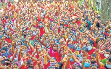  ??  ?? Thousands of anganwadi workers and employees of road transport corporatio­ns participat­e in a protest rally demanding equal pay as government employees, in Bengaluru, Karnataka on Wednesday. Both groups demanded that they be treated on a par with government employees of their equivalent cadre and be made eligible for benefits.