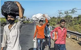  ?? ATUL LOKE/THE NEW YORK TIMES ?? During the past two months under India’s lockdown, millions of migrant laborers and their families have poured out of cities as they try to get back to their native villages.