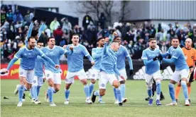  ?? Photograph: Troy Wayrynen/USA Today Sports ?? New York City FC celebrate after beating the Portland Timbers on penalties in the MLS Cup final at Providence Park on Saturday.