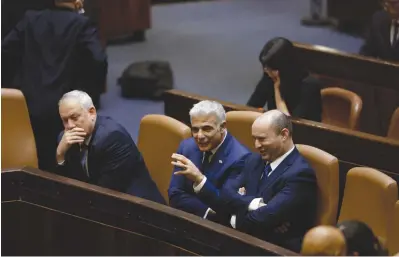  ?? (Olivier Fitoussi/Flash90) ?? PRIME MINISTER Naftali Bennett with Foreign Minister Yair Lapid and Defense Minister Benny Gantz in the Knesset Sunday.