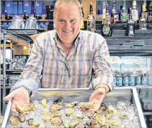  ?? DAVE STEWART/THE GUARDIAN ?? Liam Dolan, chairman of the P.E.I. Internatio­nal Shellfish Festival, says this year’s event will feature at least 22 varieties of oysters and an attempt to create the world’s longest continuous lobster roll. The event runs Thursday to Sunday at the...