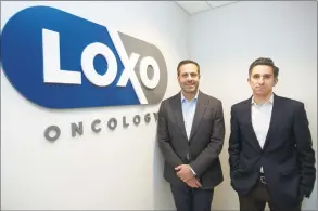  ?? Michael Cummo / Hearst Connecticu­t Media ?? Loxo Oncology founder and CEO Josh Bilenker, left, and Chief Business Officer Jacob Van Naarden inside the company’s headquarte­rs on Tresser Boulevard.