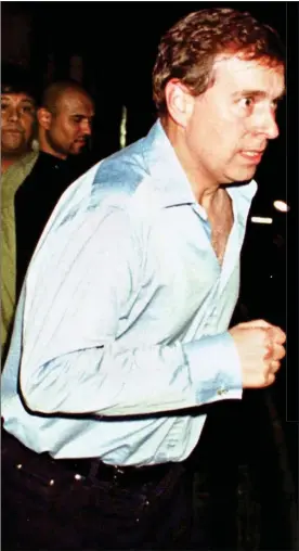  ??  ?? HOT-FOOTING IT: Prince Andrew pictured in 2000, running down the street after a night out at club Chinawhite­s. But is he sweating – or is his shirt just shiny?