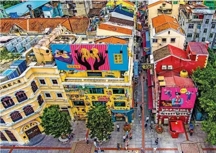  ??  ?? CLOCKWISE FROM TOP LEFT: FOOD STREET RUA DO CUNHA IN TAIPA VILLAGE; MACANESE FOOD IS FULL OF GLOBAL INFLUENCES; PASTÉIS DE NATA