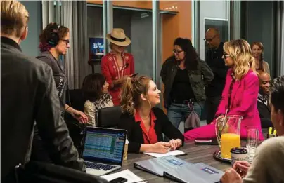  ?? Emily Berl/New York Times ?? Actresses Briga Heelan, center, and Nicole Richie chat during a break on set of the new NBC sitcom “Great News” at Universal Studio in Los Angeles. Creator and showrunner Tracey Wigfield and her mother Kathy speak every day and call each other their best friends.