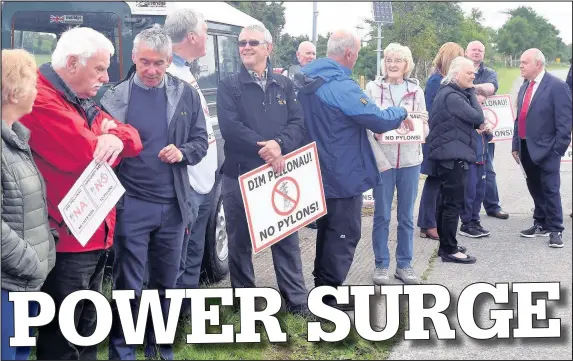  ??  ?? Residents of Anglesey protesting at the National Grid centre in Pentir, Gwynedd about the plans for pylons on the island