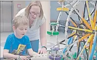  ?? SUBMITTED PHOTOS ?? Anne Luker of Sydney Mines is seen here with her son Mason. Luker had her wish for an interactiv­e Lego city to entertain children at the Cape Breton Regional Hospital come true when it was chosen by BMO Financial Group.