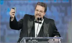  ?? PETER J. THOMPSON/ POSTMEDIA NEWS ?? Will Ferguson celebrates winning the 2012 Scotiabank Giller Prize for his book 419 at Toronto’s Ritz- Carlton hotel on Tuesday night.